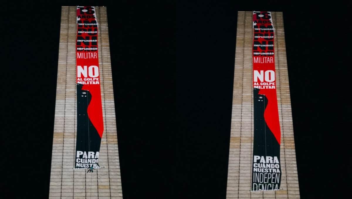 Despliegan manta monumental en Estela de Luz vs la militarización