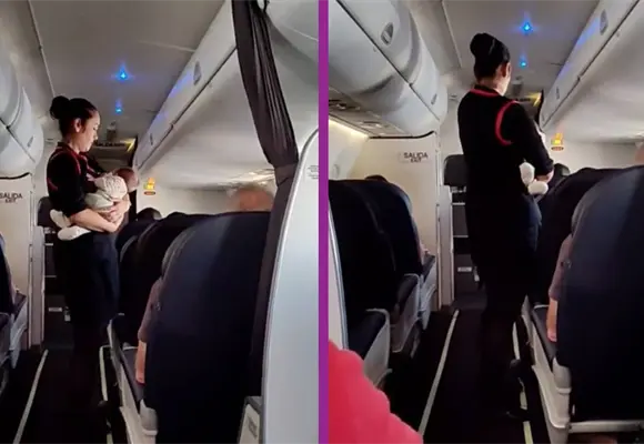 Asistente de vuelo cuida a un beb&eacute; dentro del avi&oacute;n mientras su madre iba al ba&ntilde;o